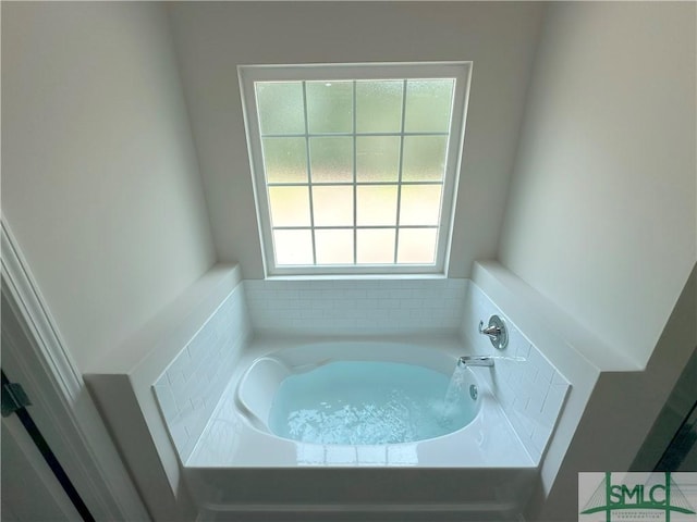 bathroom featuring a tub