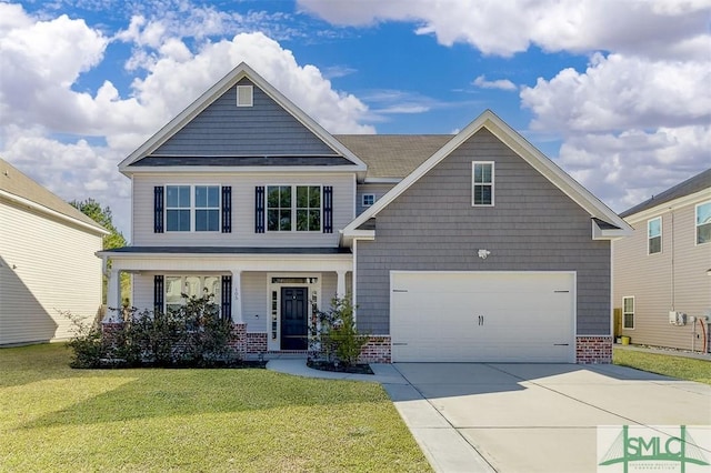 craftsman-style house featuring a front yard, a garage, and a porch