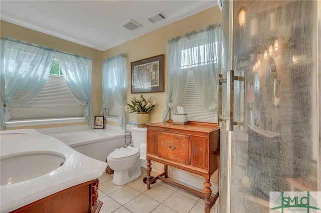 bathroom featuring tile patterned floors, vanity, and toilet