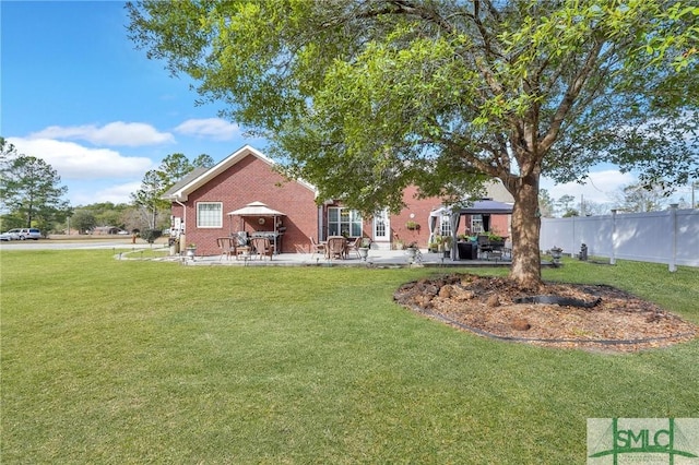 view of yard featuring a gazebo and a patio area