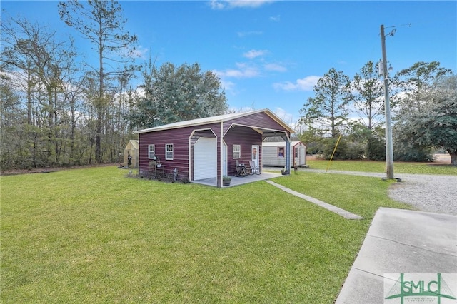 exterior space featuring a garage, a storage shed, and a carport