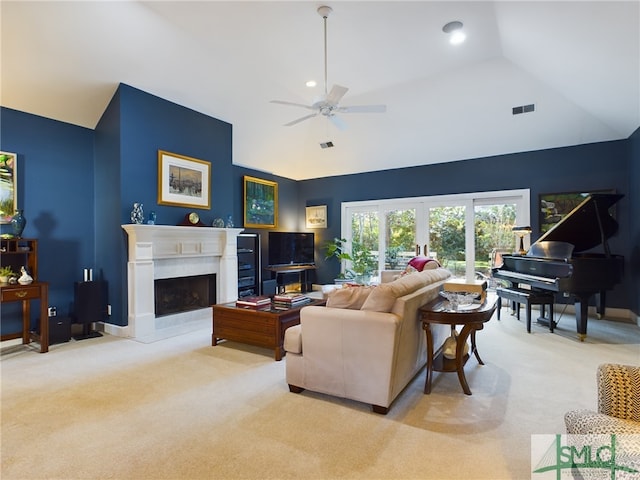 living room featuring lofted ceiling, light carpet, french doors, and ceiling fan