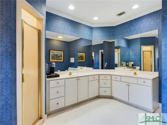 bathroom with ornamental molding, walk in shower, and vanity