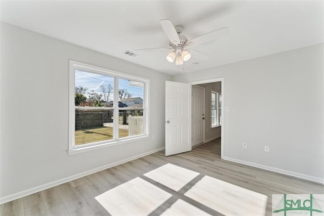 interior space with light hardwood / wood-style flooring and ceiling fan