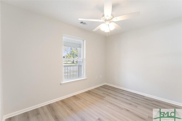 unfurnished room with light hardwood / wood-style flooring and ceiling fan