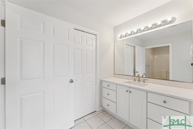 bathroom featuring vanity and tile patterned floors