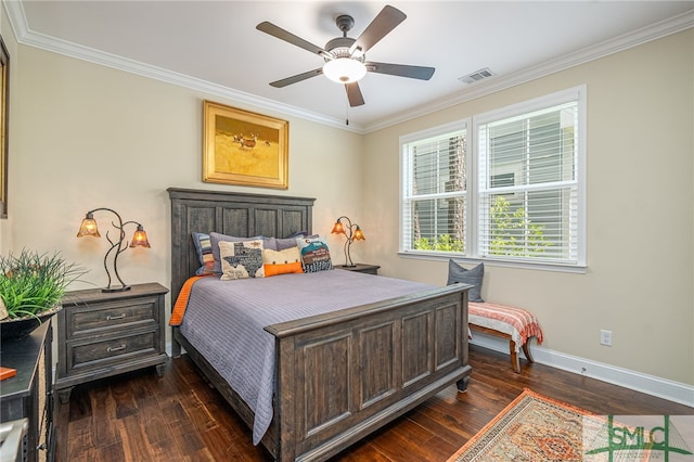 bedroom featuring dark wood-type flooring, ceiling fan, and ornamental molding