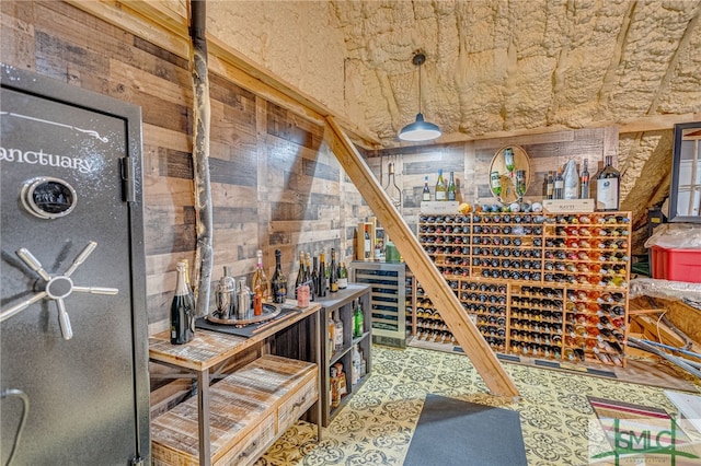 wine room with wood walls