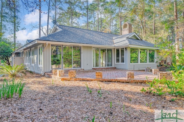 rear view of house featuring a patio area