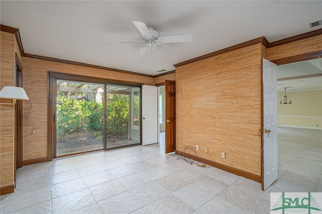 spare room with ceiling fan and crown molding