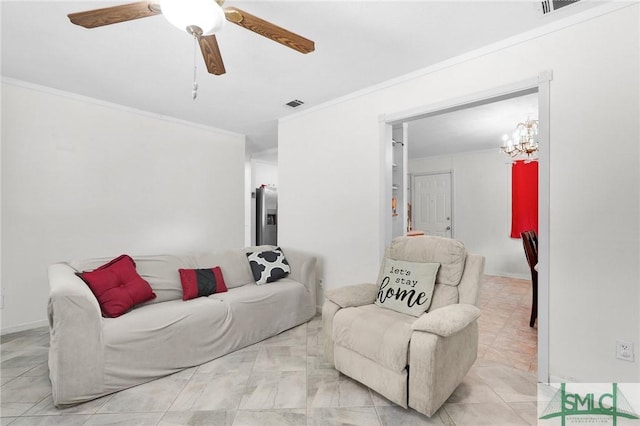 living room with ornamental molding and ceiling fan with notable chandelier