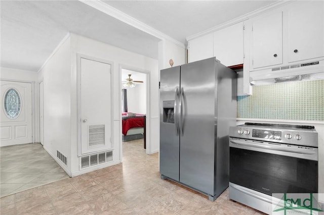 kitchen featuring white cabinetry, ceiling fan, appliances with stainless steel finishes, backsplash, and crown molding