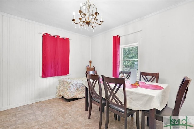 dining area with an inviting chandelier and ornamental molding