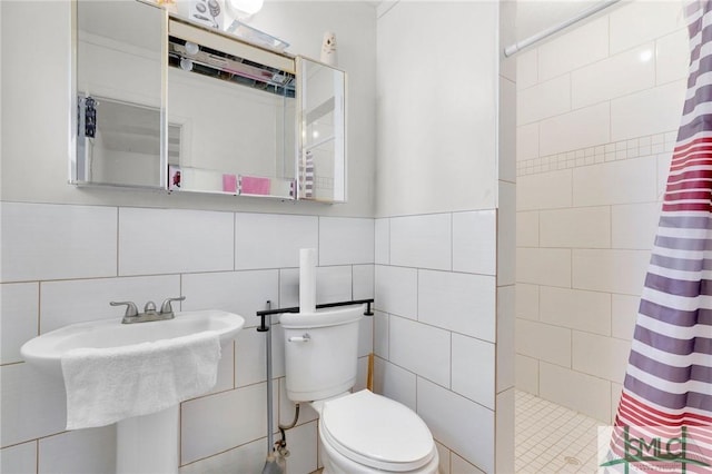 bathroom featuring backsplash, tile walls, toilet, and a shower with shower curtain