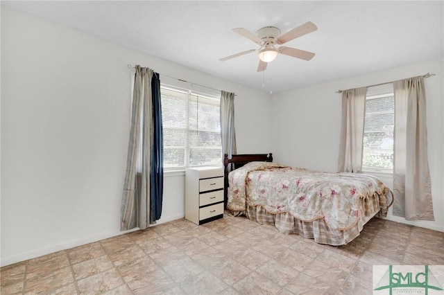 bedroom featuring ceiling fan