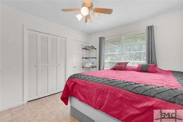 bedroom featuring ceiling fan and a closet