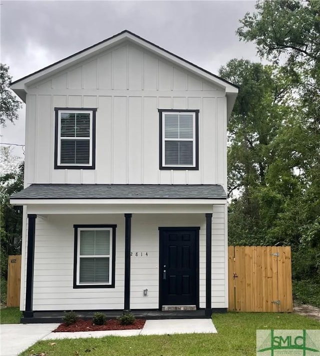 2814 Julia Law St, Savannah, GA 31405 - view of front of home featuring board and batten siding, covered porch, and a shingled roof