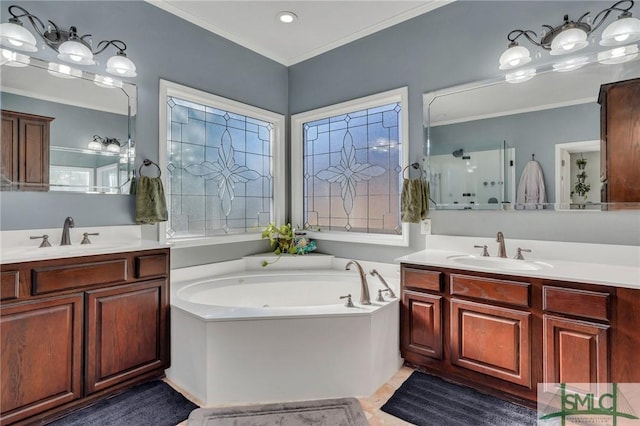 bathroom featuring separate shower and tub, vanity, and ornamental molding