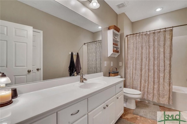 full bathroom with toilet, vanity, and shower / bath combo with shower curtain