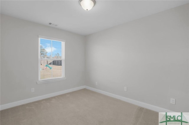 empty room featuring carpet flooring