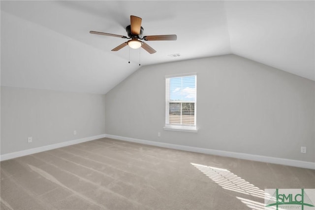 bonus room featuring light carpet, ceiling fan, and lofted ceiling