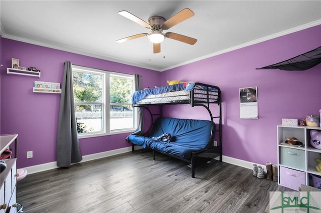 bedroom with ceiling fan, dark wood-type flooring, and ornamental molding