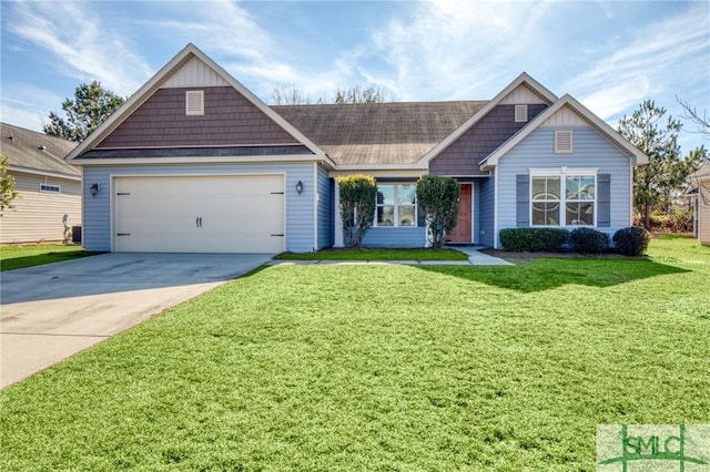 view of front facade featuring a garage and a front yard