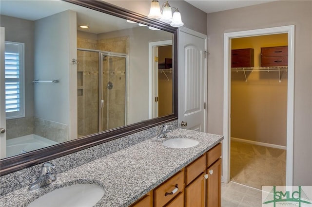 bathroom featuring vanity and plus walk in shower