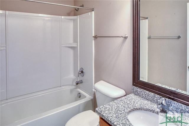 full bathroom with shower / bathtub combination, vanity, and toilet