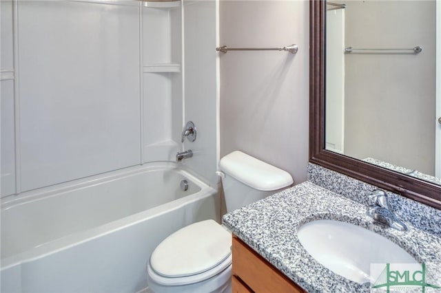 full bathroom with vanity, bathtub / shower combination, and toilet