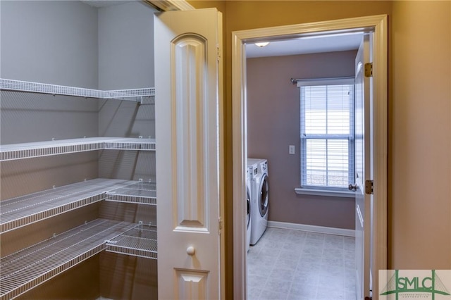 washroom featuring independent washer and dryer