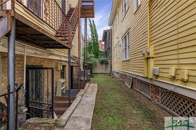 view of property exterior with central AC unit