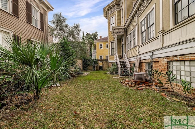 view of yard featuring central AC unit