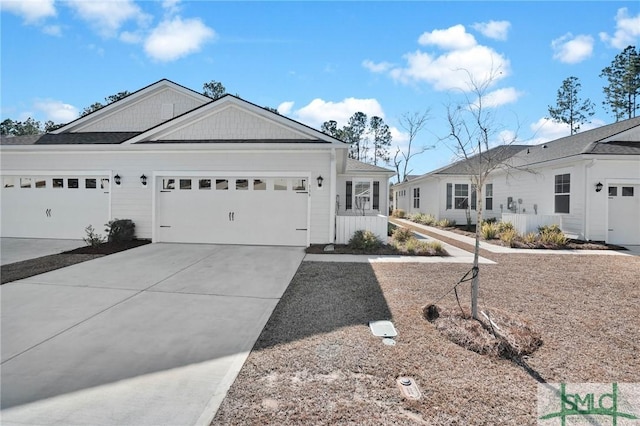 ranch-style home featuring a garage