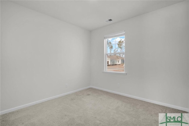 view of carpeted spare room