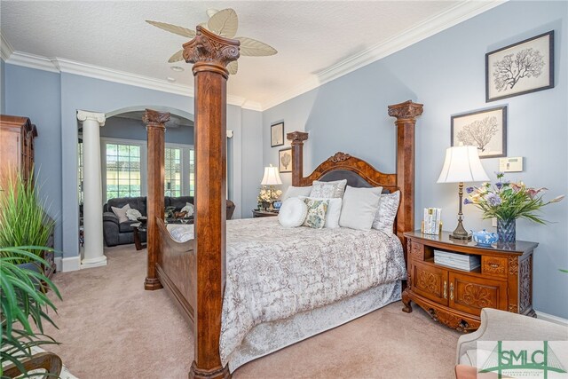 bedroom featuring ornate columns, a textured ceiling, crown molding, and light colored carpet