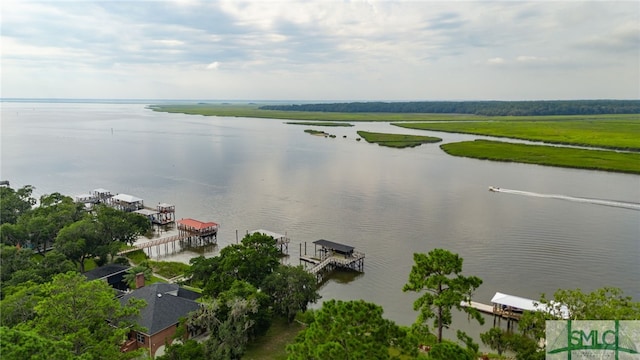 drone / aerial view with a water view