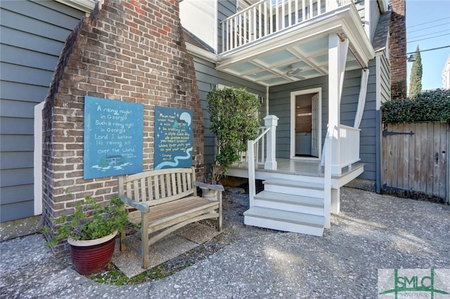 property entrance with a balcony