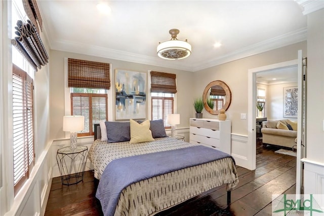 bedroom featuring dark wood-type flooring and ornamental molding