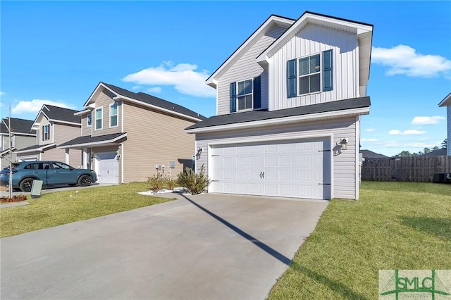 view of front of house featuring a garage and a front lawn