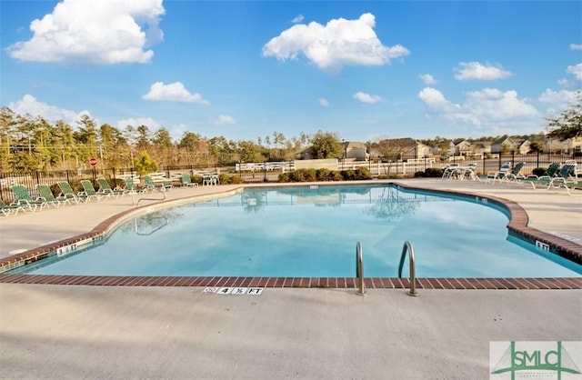 view of pool featuring a patio