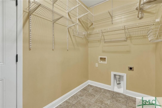 laundry area with washer hookup and hookup for an electric dryer