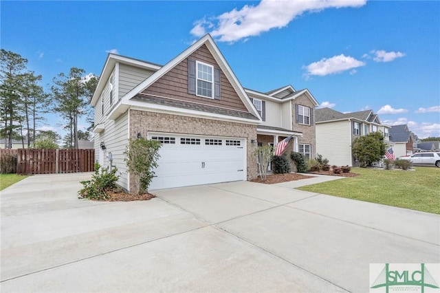 view of front facade with a garage and a front yard