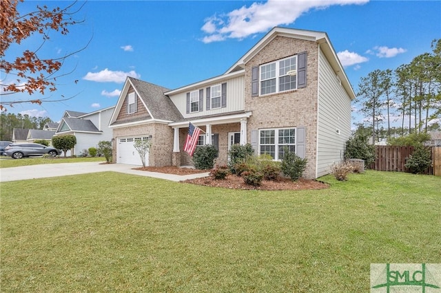 view of front facade with a garage and a front lawn