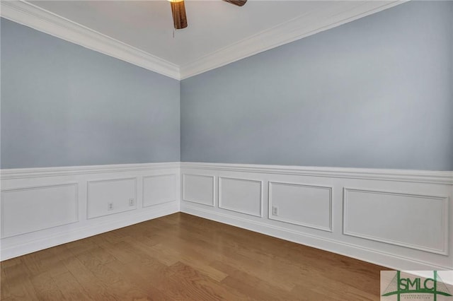 unfurnished room with crown molding, hardwood / wood-style floors, and ceiling fan