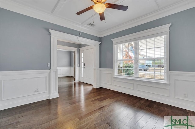 empty room with crown molding, beam ceiling, ceiling fan, and dark hardwood / wood-style flooring