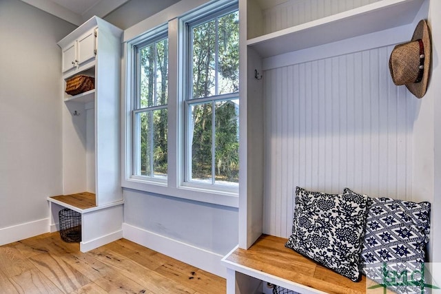 mudroom with light hardwood / wood-style floors