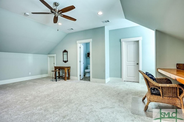 bonus room with ceiling fan, lofted ceiling, and light carpet