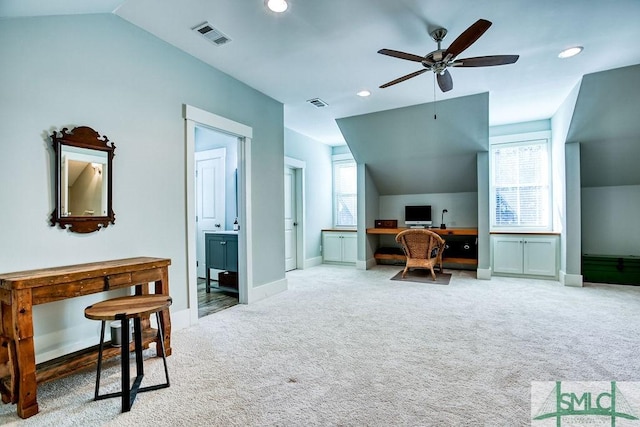 office area with ceiling fan, lofted ceiling, and carpet flooring