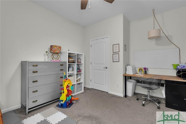 office with ceiling fan and light colored carpet